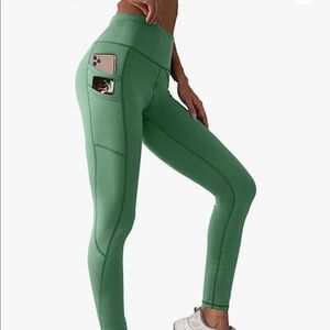Fleece lined multi pocket green leggings in a women’s size small.